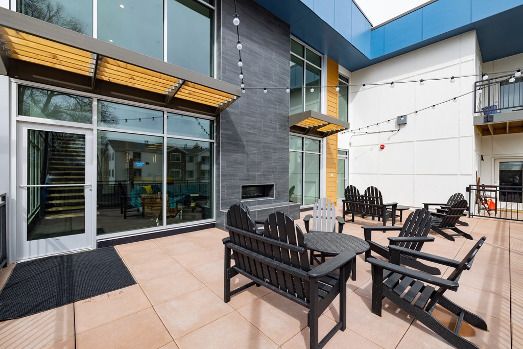 A patio with a table and chairs is shown.