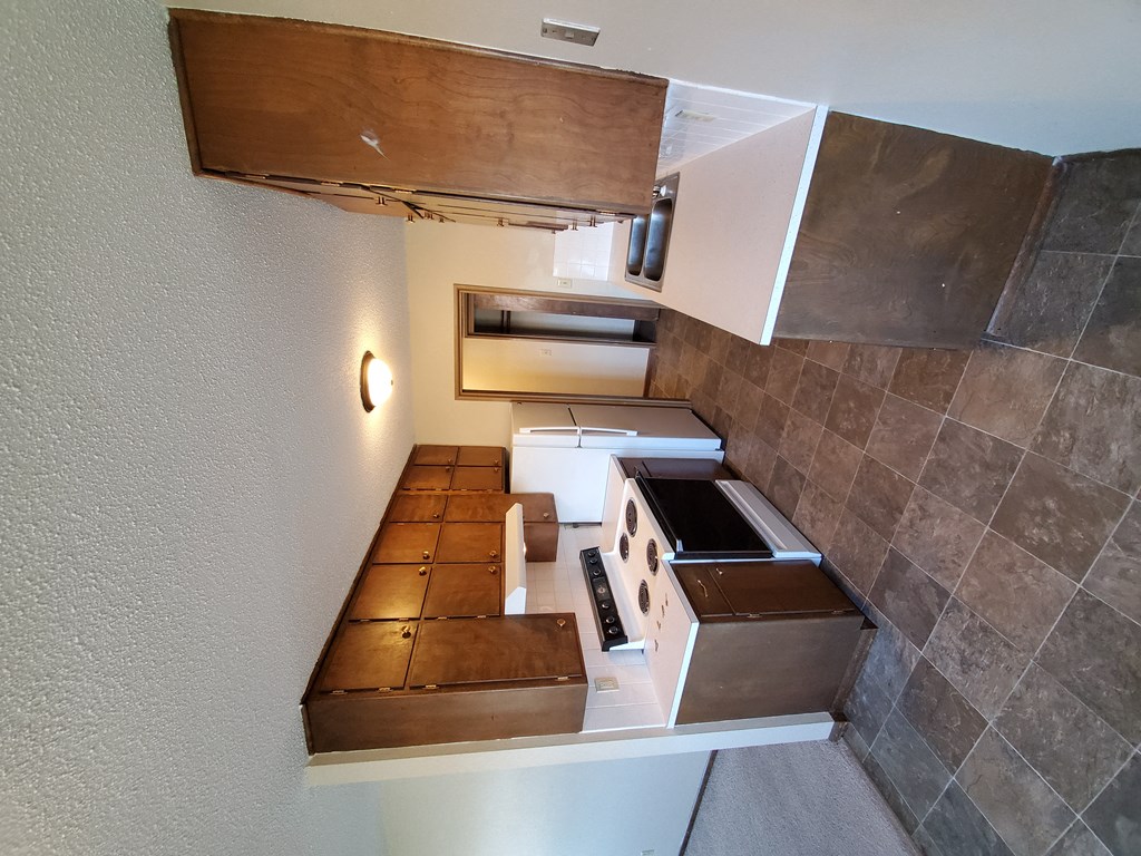 a view of the kitchen from the loft