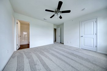 bedroom with grey carpet natural light - Photo Gallery 34