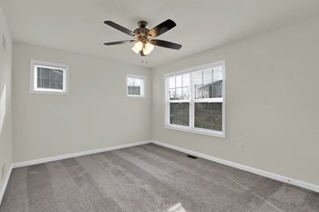 living room with carpet and ceiling fan - Photo Gallery 13