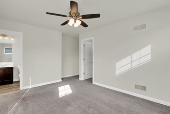 master bedroom grey carpet ceiling fan natural light - Photo Gallery 14