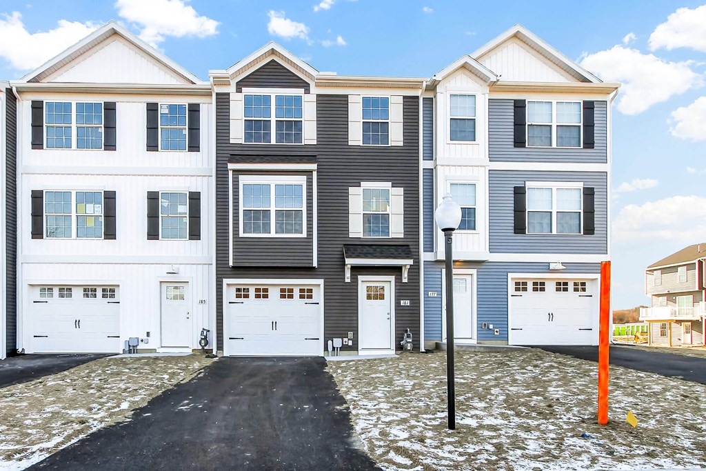exterior grey and sage siding white trim white garage