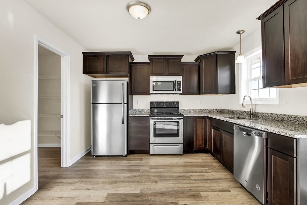 Kitchen with espresso cabinets at Hudson Ridge, Pennsylvania, 17356