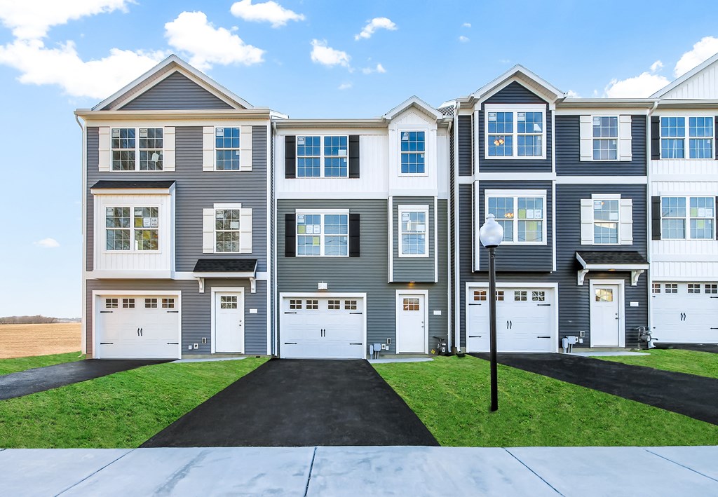 exterior grey and sage siding white trim white garage