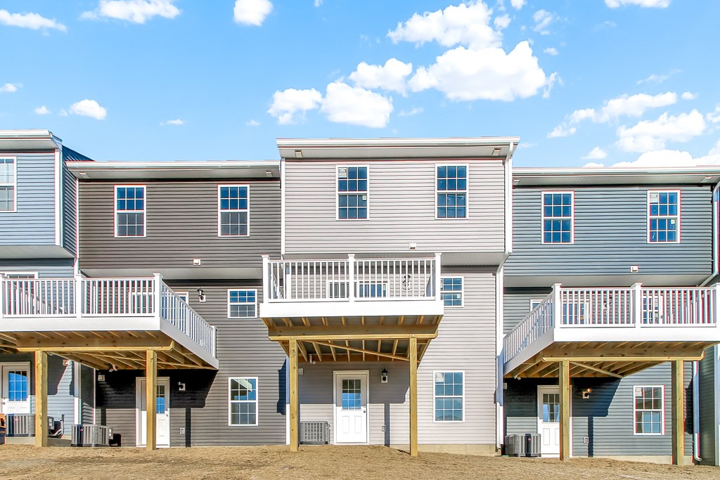 exterior grey and sage siding white trim deck and walkout basement