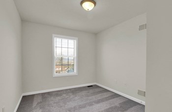 bedroom with grey carpet natural light - Photo Gallery 16