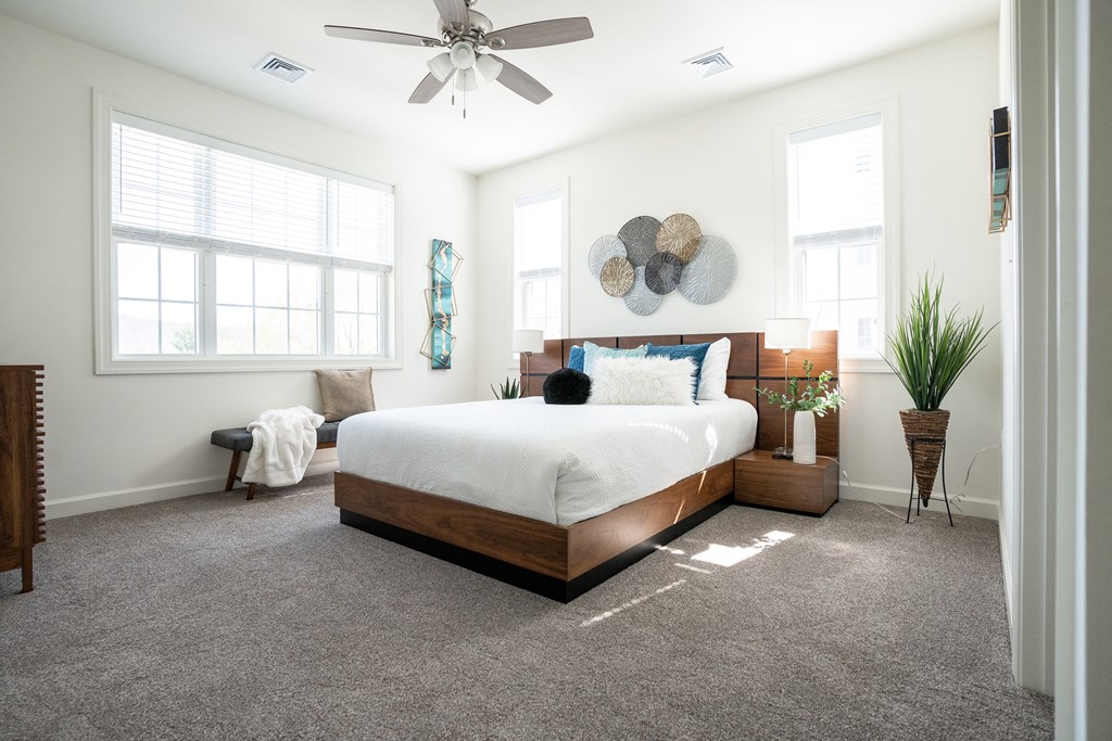 Bedroom with a bed and two windows  at Hadley Place Apartments, Pennsylvania, 17025