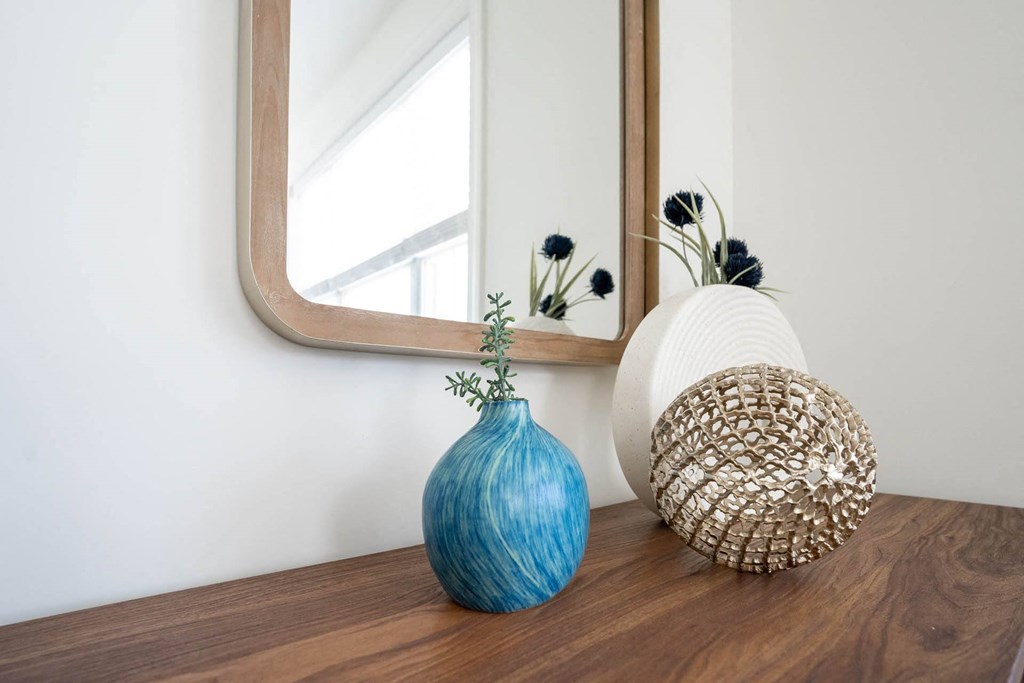 Vase and a decor on a table in front of a mirror  at Hadley Place Apartments, Pennsylvania,