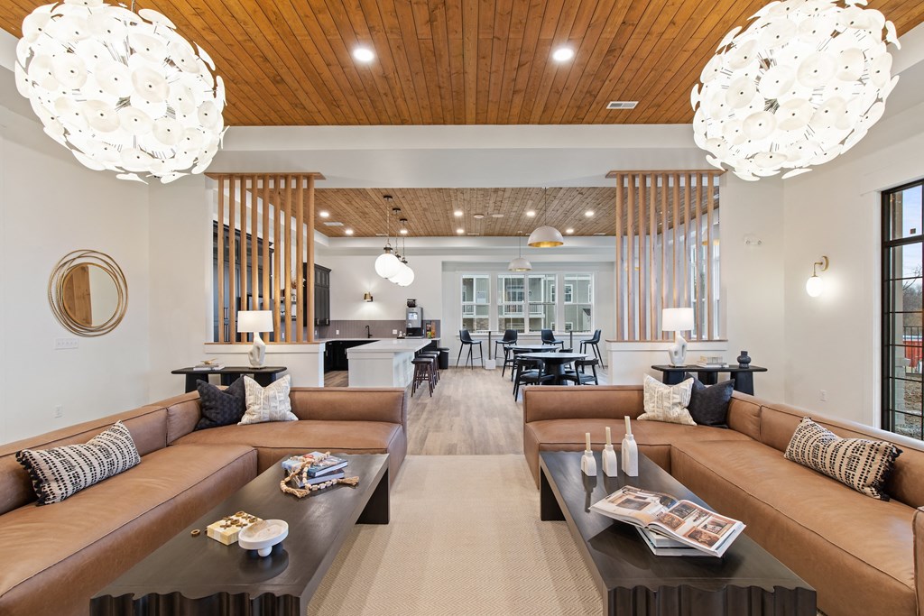 Large living room with couches and tables at Hadley Place Apartments, Pennsylvania, 17025