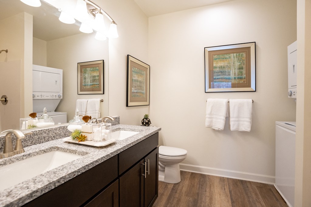 a bathroom with two sinks and a toilet at Franklin Square Apartments/Townhomes, Pennsylvania, 17349