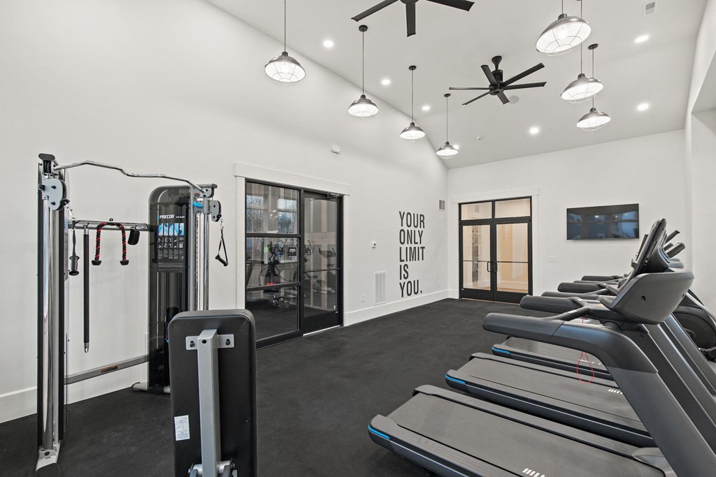Gym is equipped with cardio equipment and weights at Hadley Place Apartments, Pennsylvania, 17025