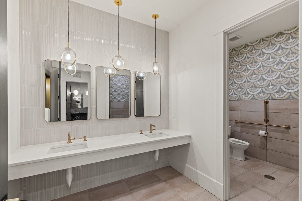 Bathroom with two sinks and three mirrors at Hadley Place Apartments, Pennsylvania, 17025