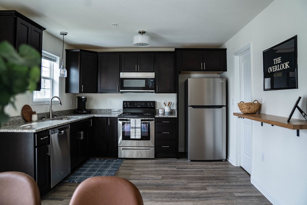 Kitchen with dark cabinets and stainless steel appliances at Gettysburg Overlook, Gettysburg, Pennsylvania