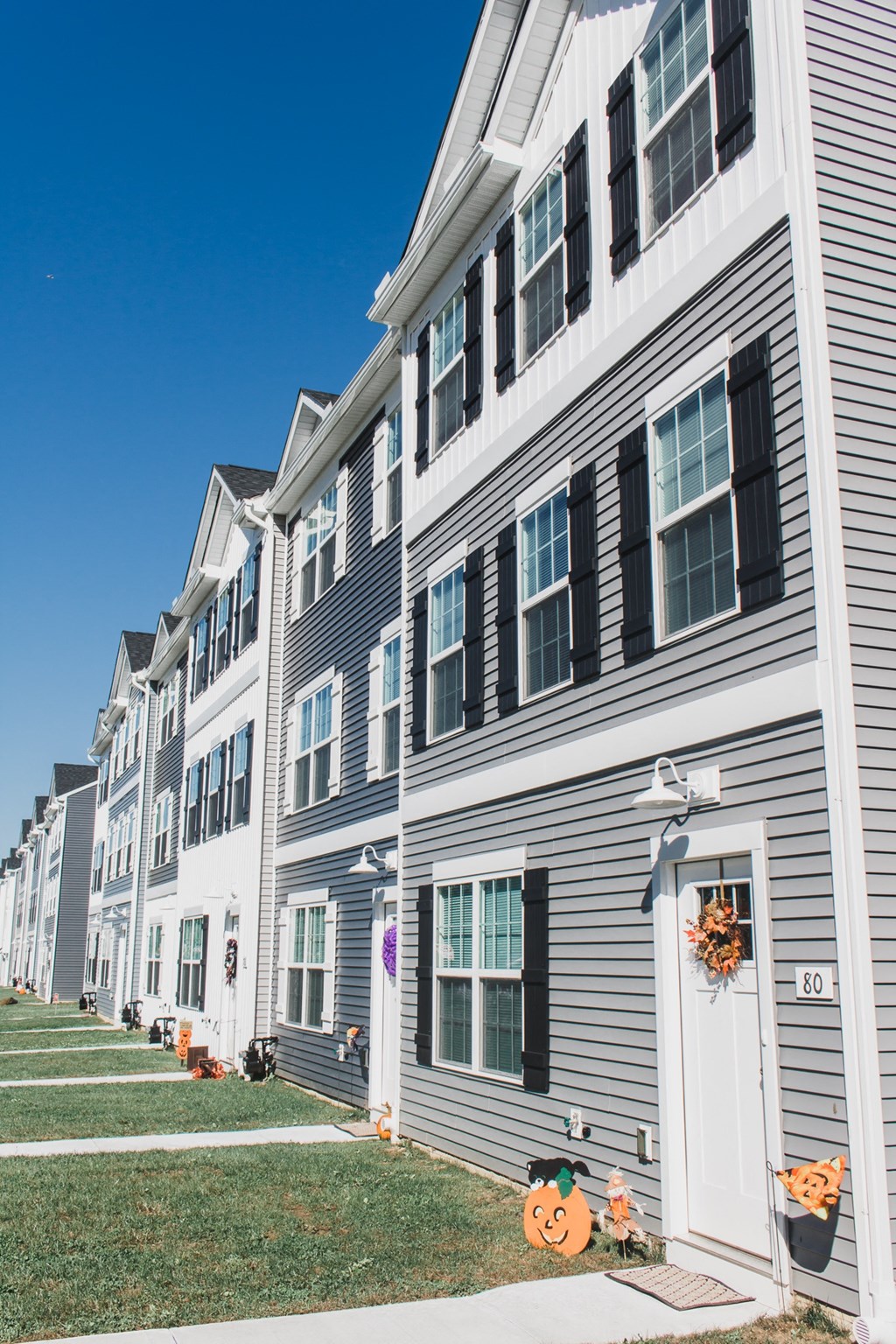 exterior grey and sage siding white trim white garage
