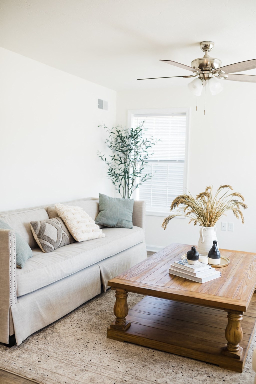 Living room natural light cream sofa wood coffee table at Gettysburg Overlook, Gettysburg, Pennsylvania