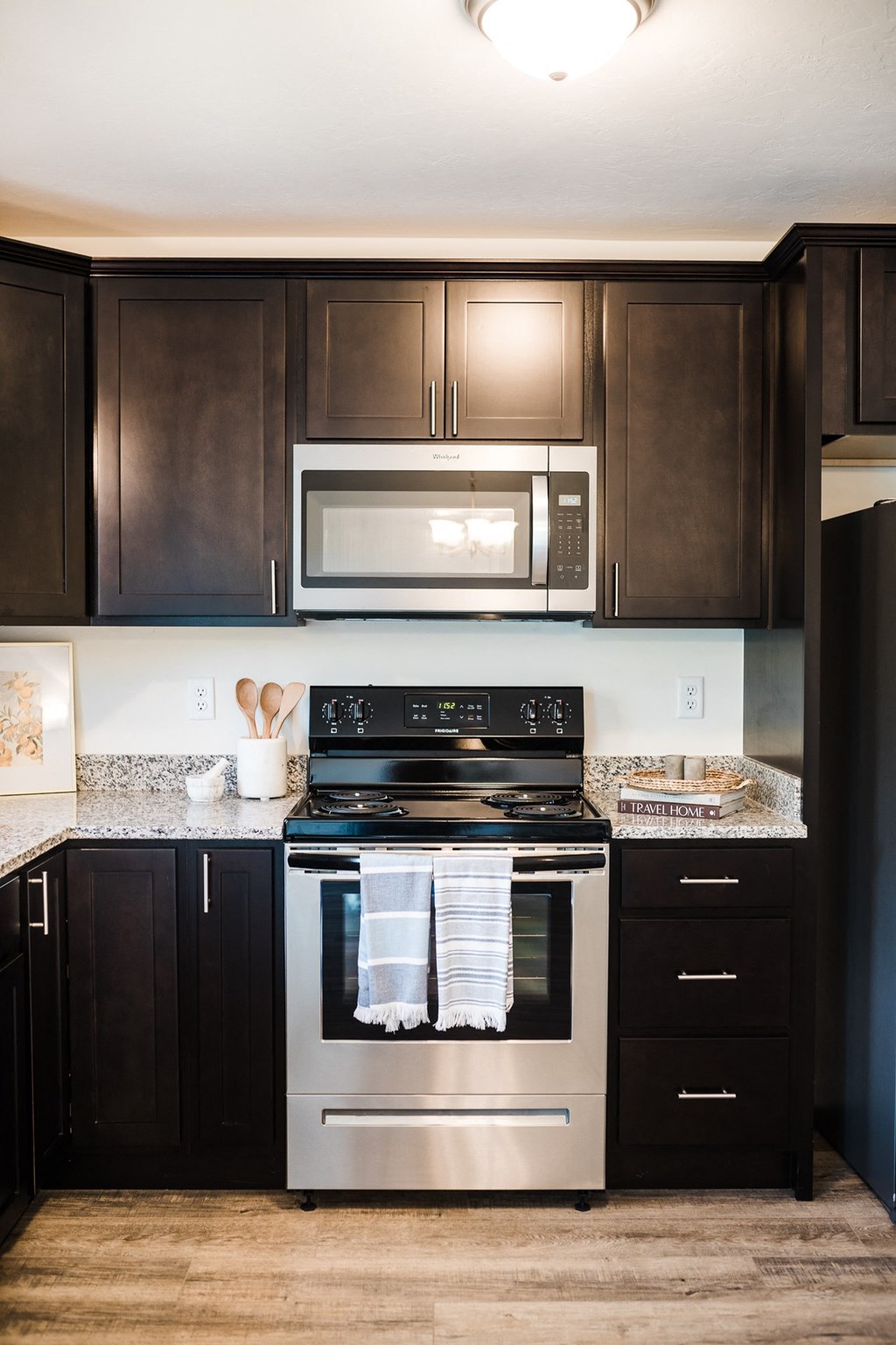 mocha cabinets stainless steel kitchen stove and microwave  at Gettysburg Overlook, Gettysburg, 17325