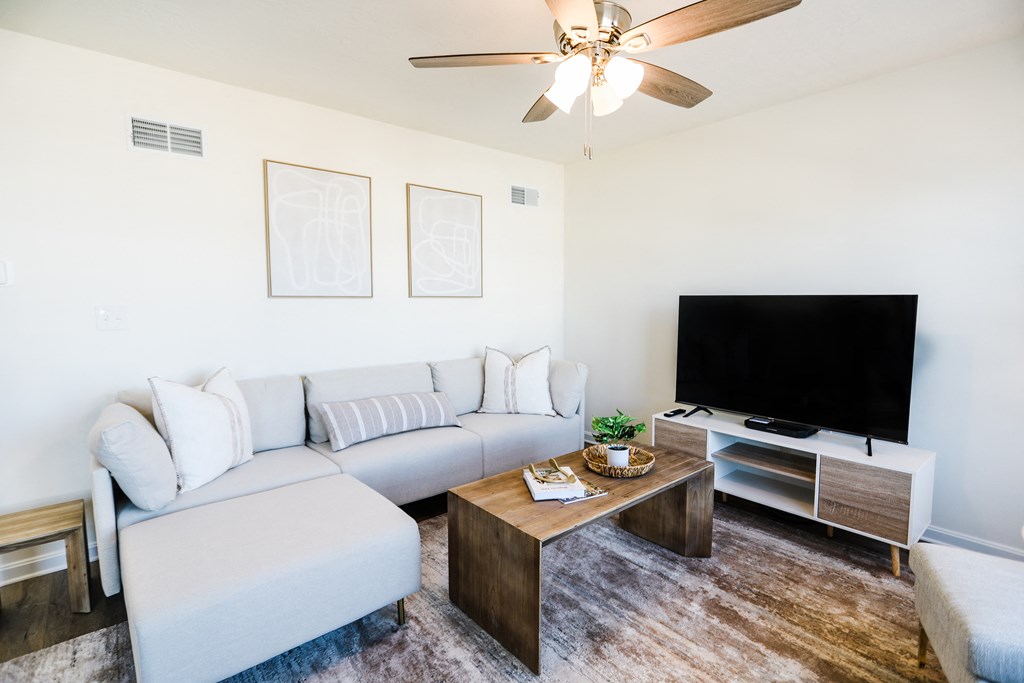 Living room with white couches and a wooden coffee table at Hudson Ridge, Pennsylvania, 17356