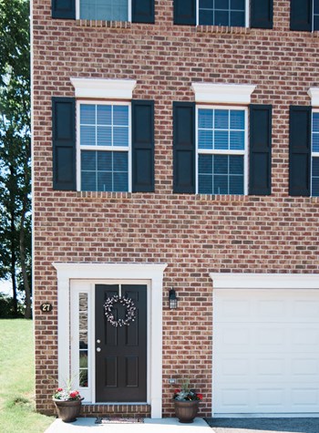 brick and beige siding beige garage doors - Photo Gallery 4