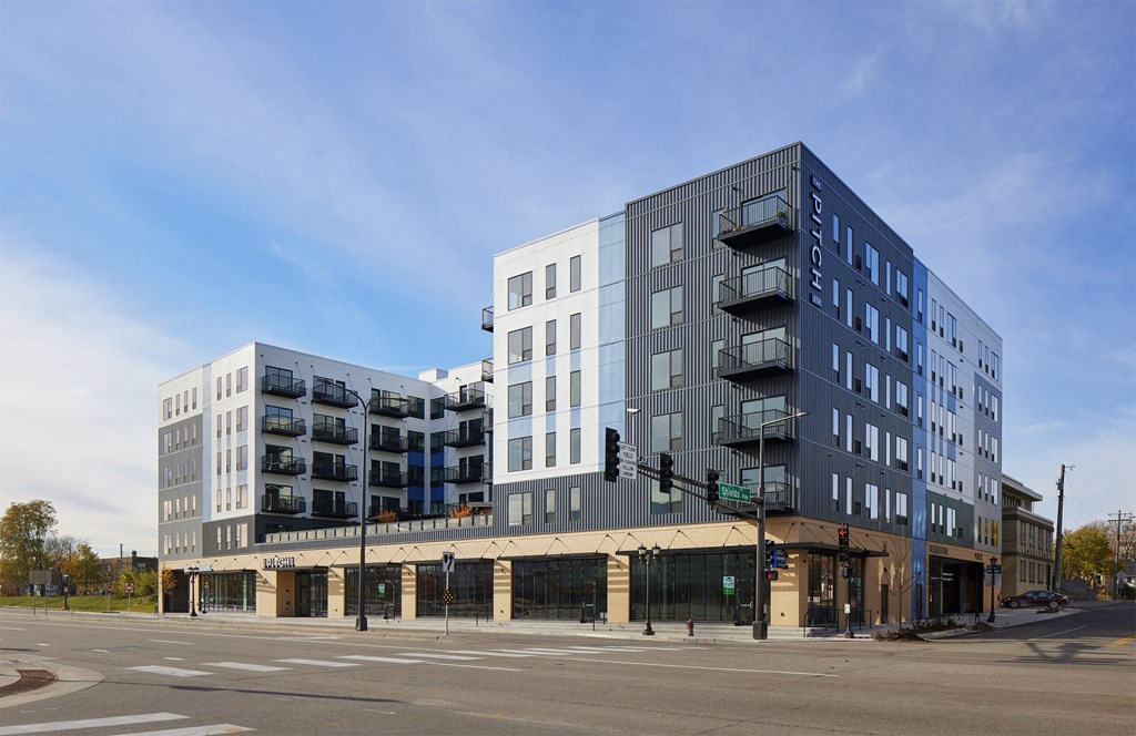 a new building on the corner of a city street
