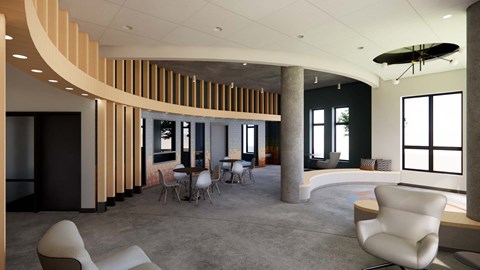 A modern living room with a curved wooden wall and a large window.