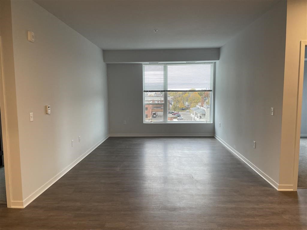 an empty room with a large window