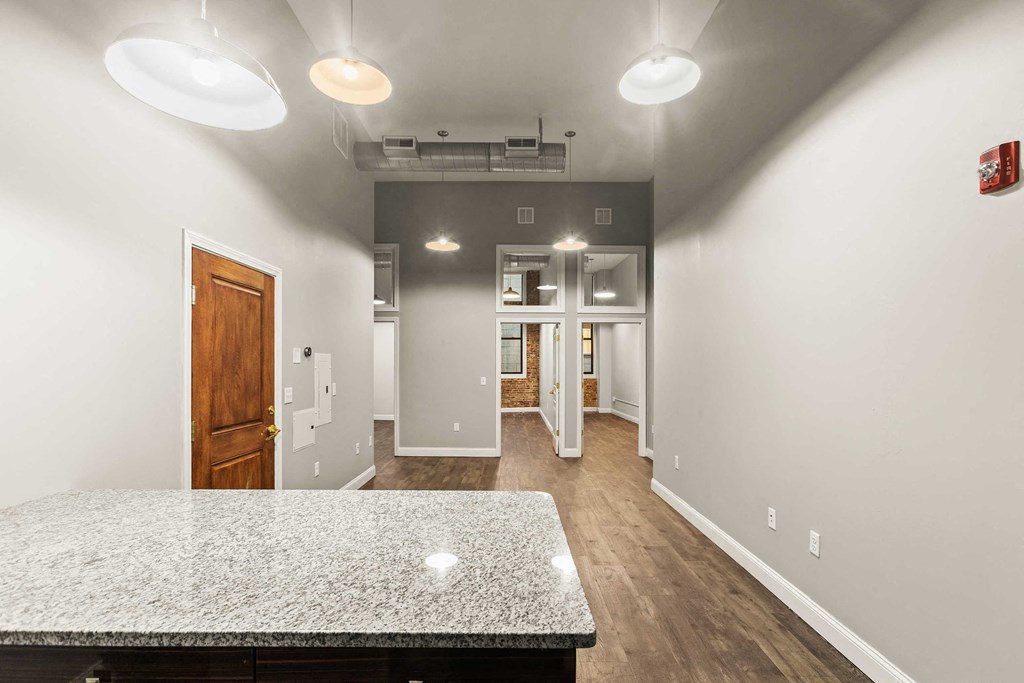 view from the kitchen into the living room and entry way