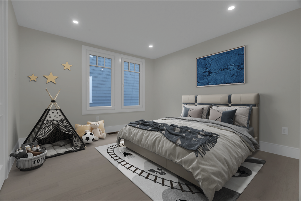 a bedroom with a bed and a toy teepee