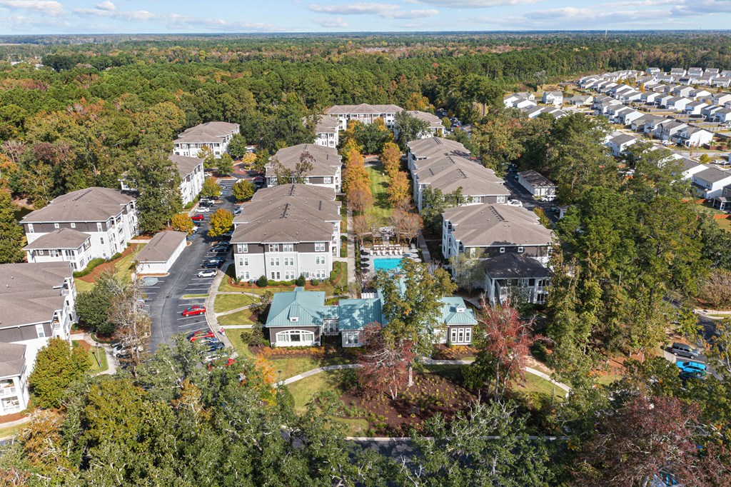 a group of houses in a neighborhood with trees