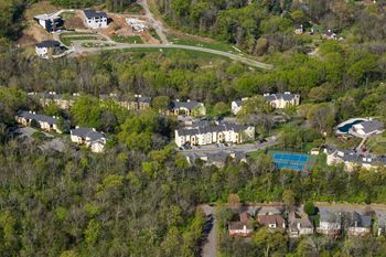 a aerial view of a neighborhood of houses and trees