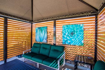 The Townhomes at Horizon Ridge Covered Seating Area near Pool - Photo Gallery 23