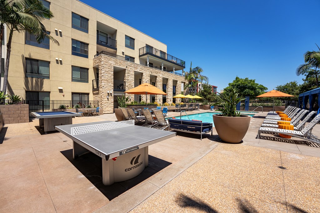 our apartments offer a clubhouse with a pool and ping pong table