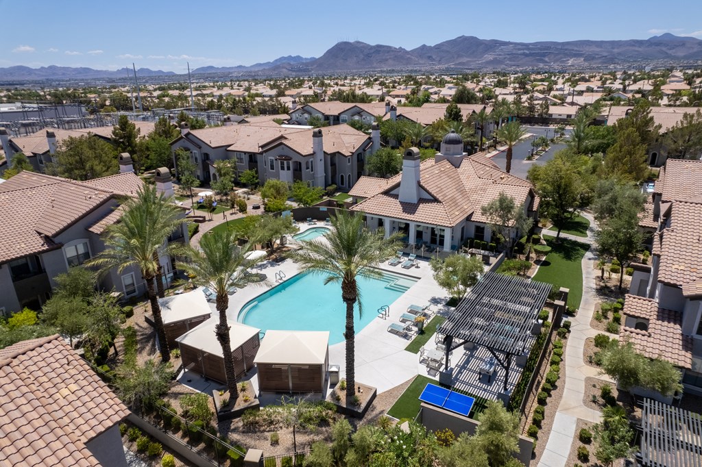 Aerial photo of the pool with cabanas, and grilling station at Cyan at Green Valley apartments in Henderson, Nevada.