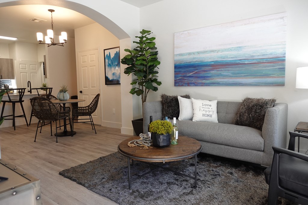 a living room with a couch and a table