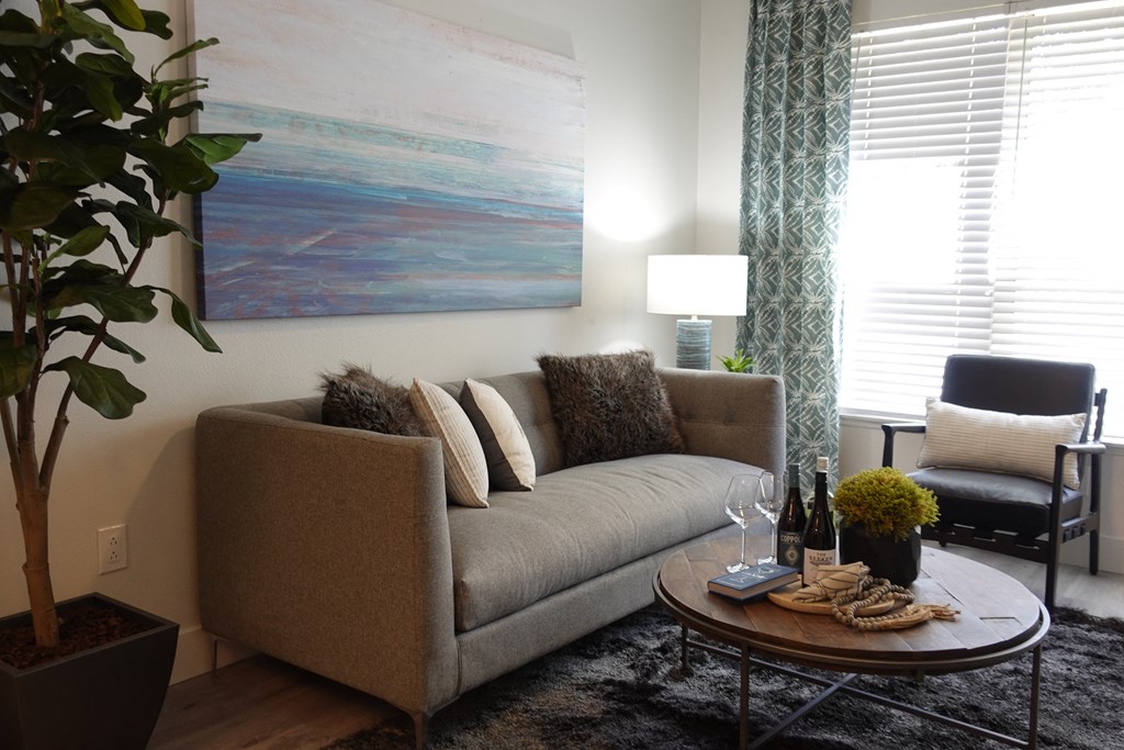 a living room with a couch and a coffee table