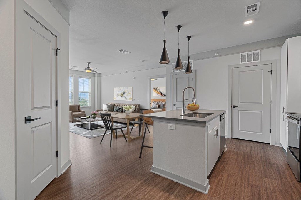 The Zeb Apartments Contour Floor Plan Virtually Staged Model Living Room and Kitchen