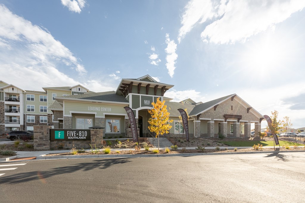 a large building with a street in front of it