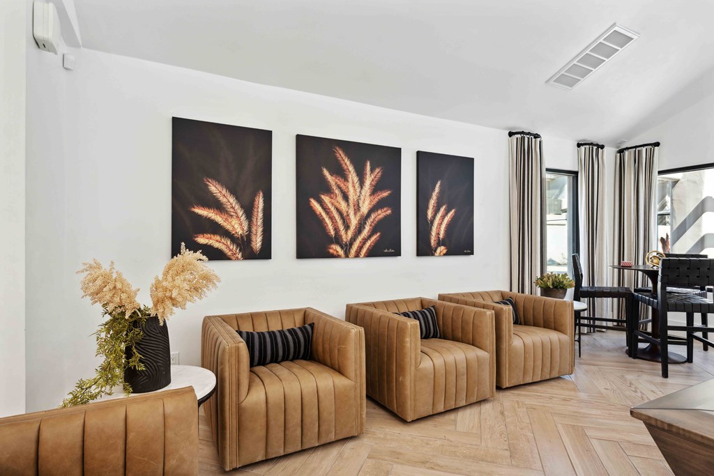 a living room filled with furniture and a large window