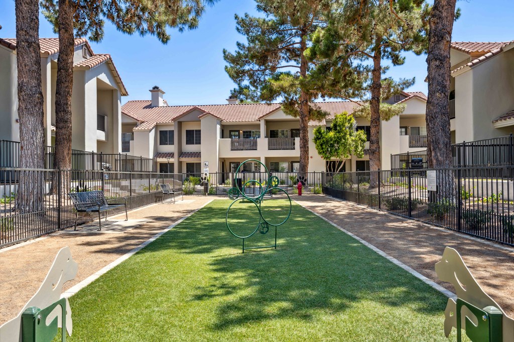 hideaway apartments offer a dog park with a playground