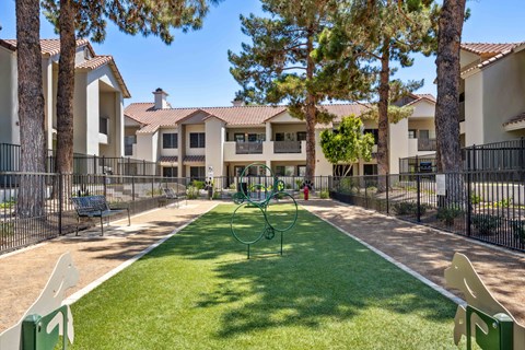 hideaway apartments offer a dog park with a playground