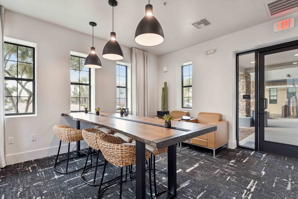 a conference room with a long table and chairs
