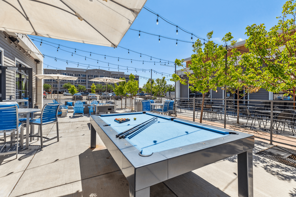 outdoor pool table on sunny patio