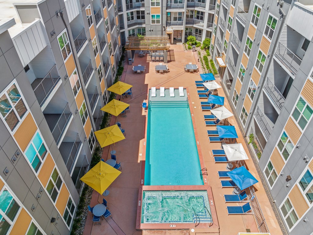 an overhead view of a swimming pool in the middle of a building
