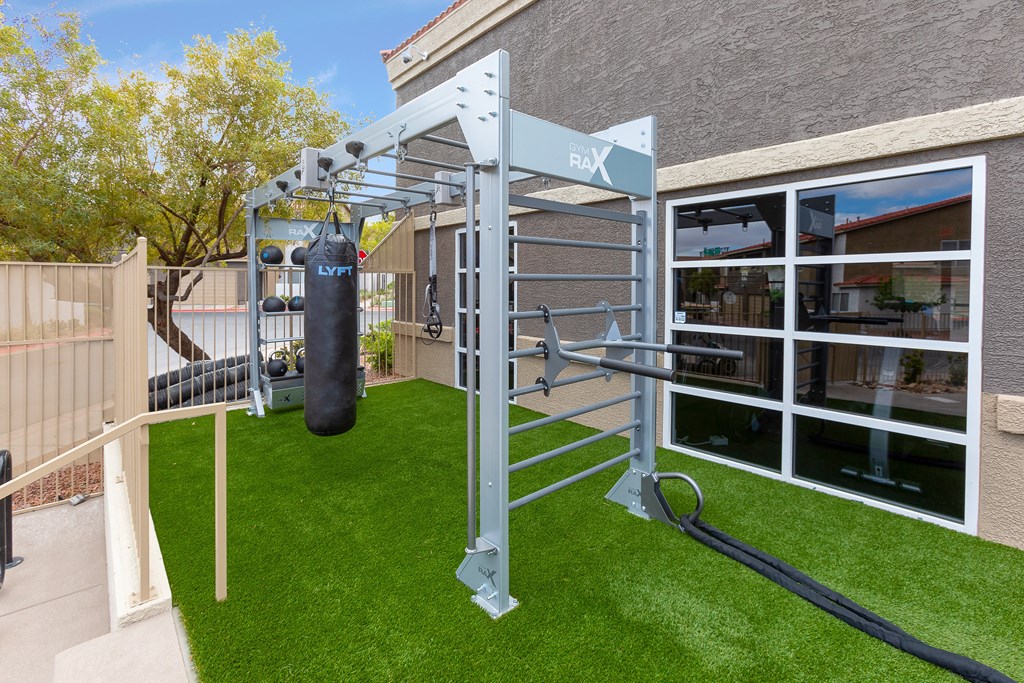 a gym with a punching bag outside of a building