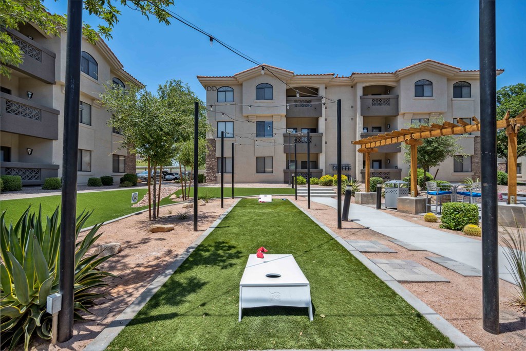 outdoor games and cornhole at San Portella apartments