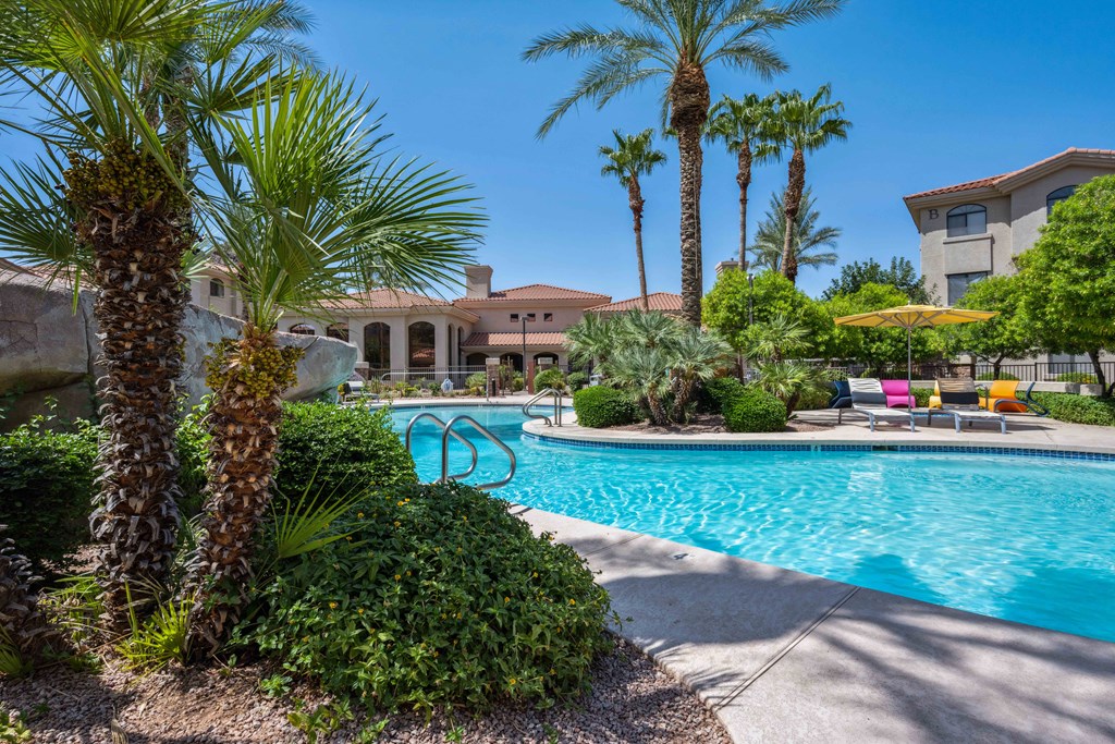 a resort style swimming pool at san portella apartments