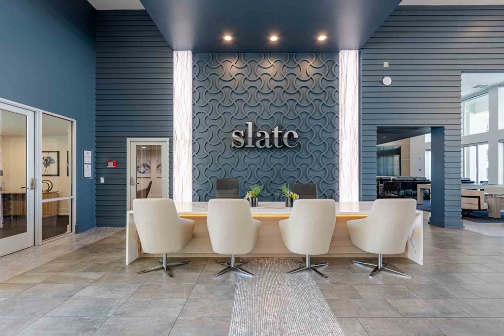 slate scottsdale leasing office with large table and chairs