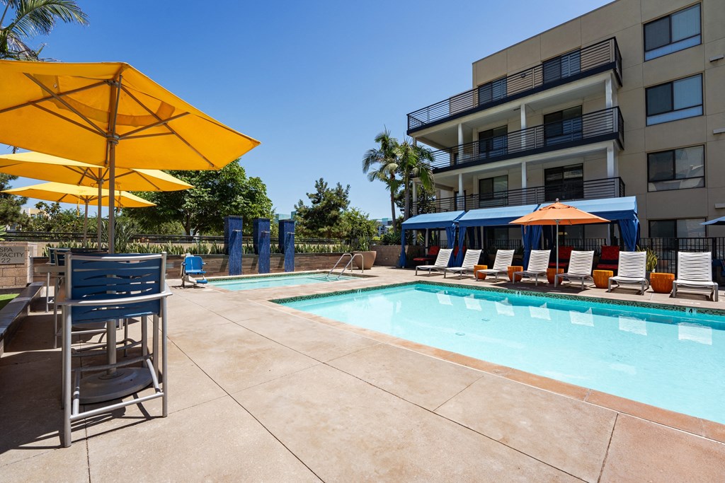 our apartments have a large pool and lounge chairs
