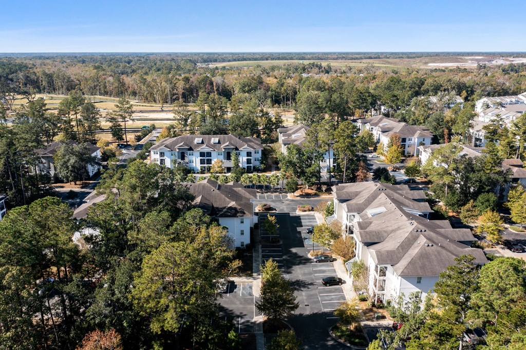 a aerial view of a neighborhood with houses and trees