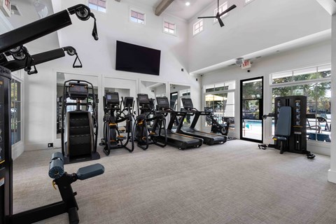 the gym is equipped with state of the art equipment including cardio machines and weights