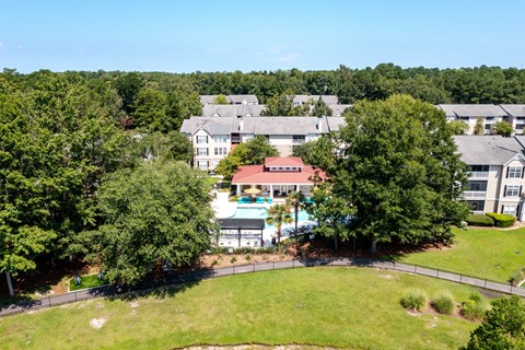 a aerial view of the resort with trees and buildings